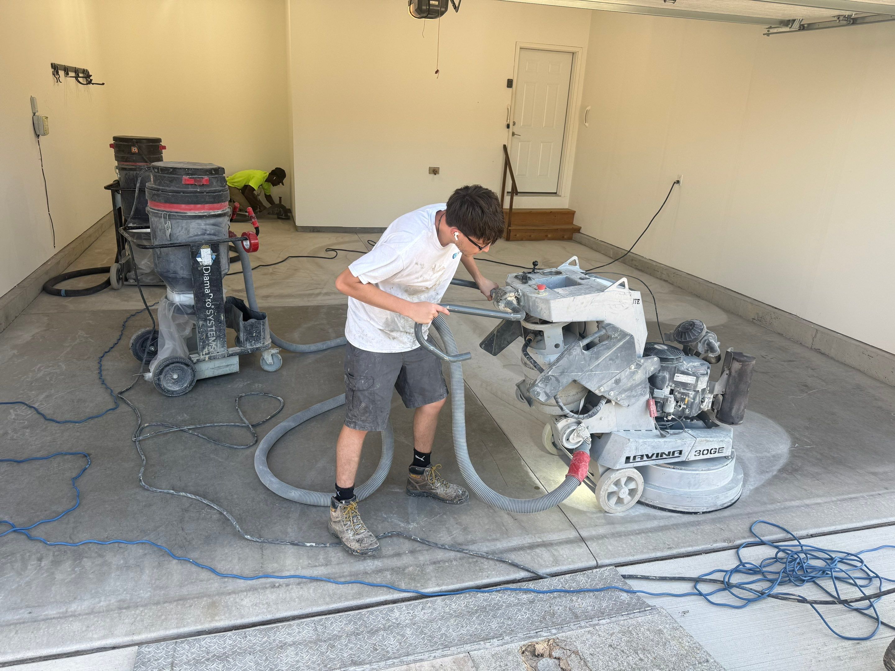 Cabin Fever Garage Floor Coating in Sioux Falls by Select Painting, Coatings & Garage Cabinets