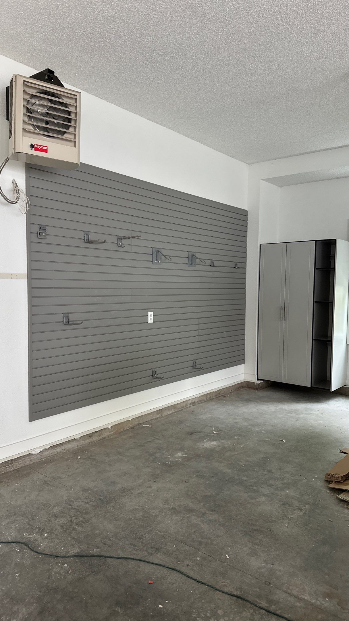 Brooke L. added cabinets for a clean storage look by Banner Garage