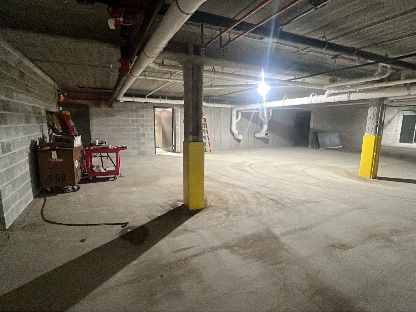 Parking garage post construction cleanup by Northern Power Washing LLC.