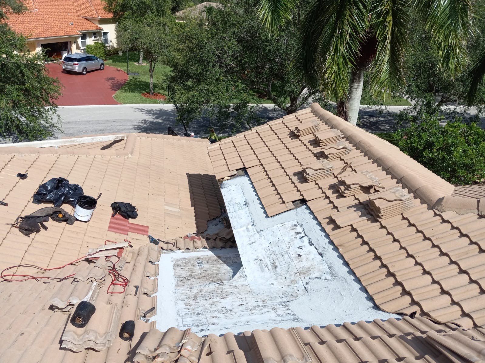 Concrete Tile Roof Leak Repair and Wood Decking Replacement in Parkland by Aastro Roofing