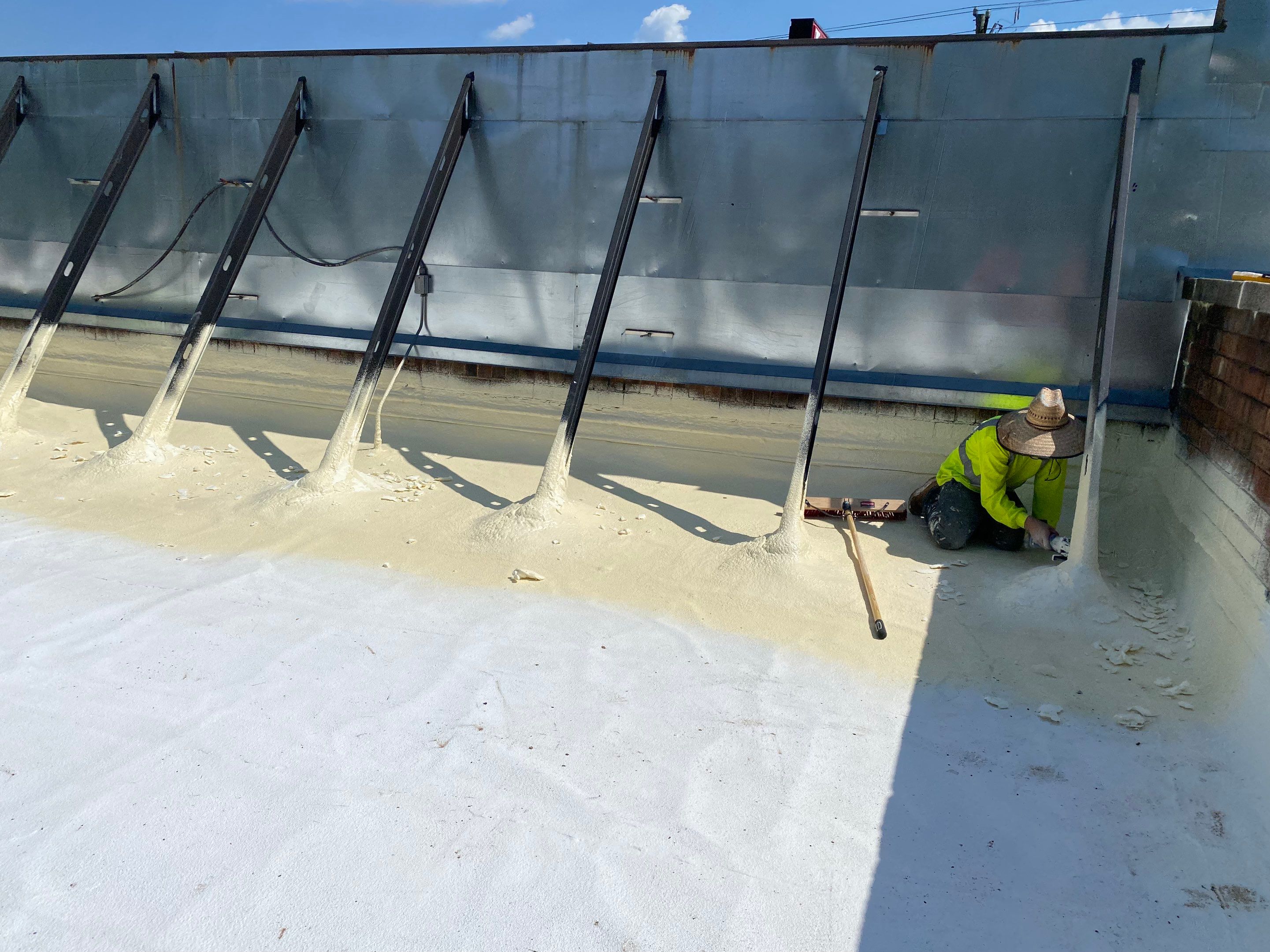 Commercial Roof Coating using Fiberseal basecoat and Silicon Topcoat by Just In Time Roofing and Restoration