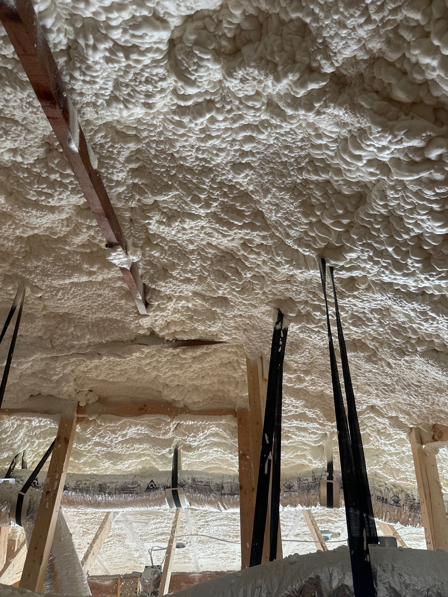 Open cell spray foam & rockwool job completed in Dallas TX by Apex Insulation Solutions