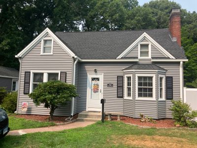 Stunning Siding Makeover with Cert Monogram D/4 x 16' clapboard, Charcoal Gray and Cert Monogram D/4x25' clapboard, Charcoal Gray