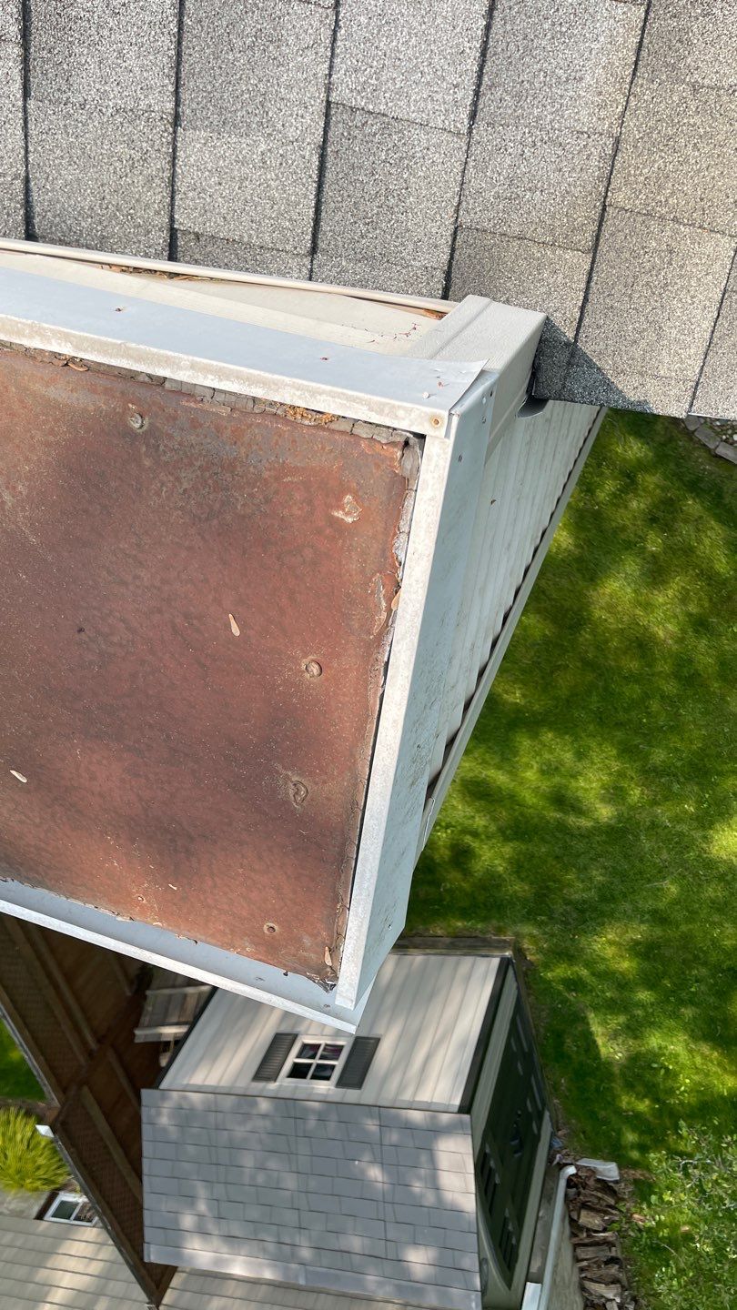 Gutter Cleaning Chimney top repair by A Plus Exterior