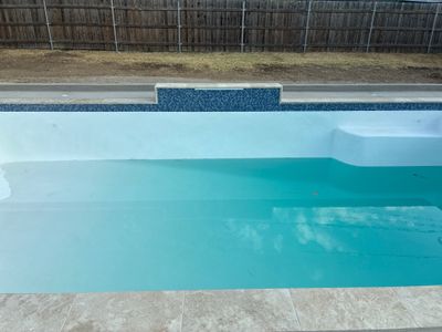 Geometric Pool Remodel with New Plaster and Travertine Coping