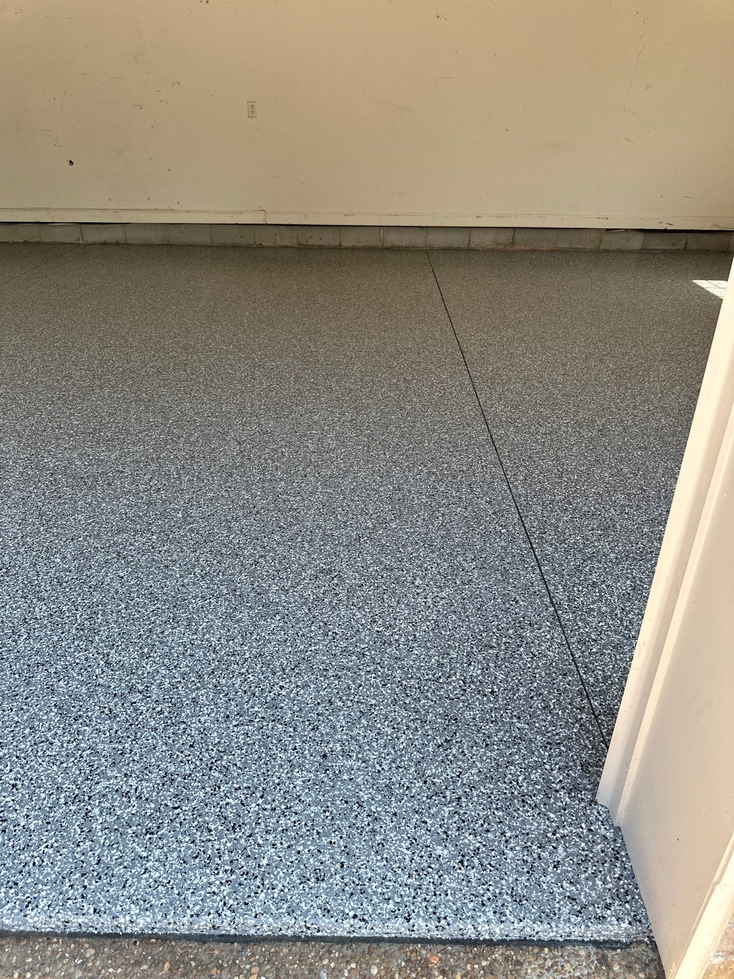 Garage Floor Coating using Wombat by My Garage Floor Guys