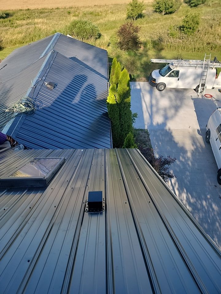  Metal Roof Installation on Residential Brick Home in Oostburg, WI by Gellings Roofing & Siding
