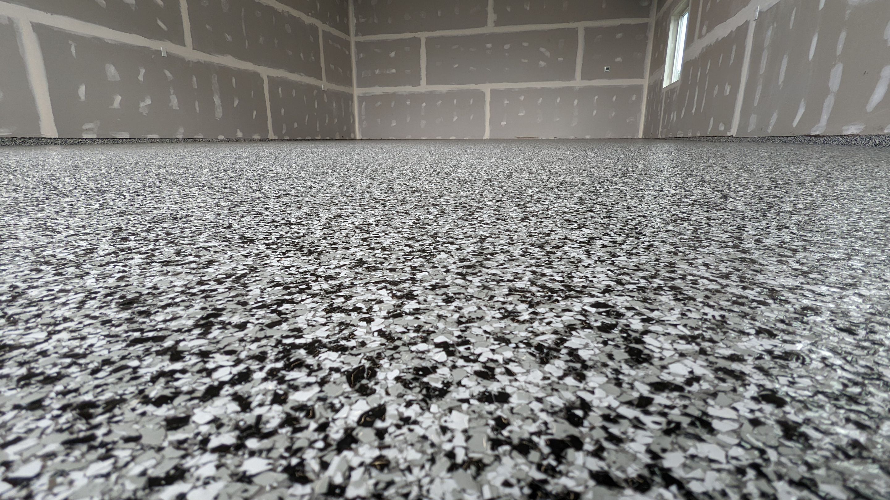 Garage Transformation using Domino by Croc Coatings, LLC