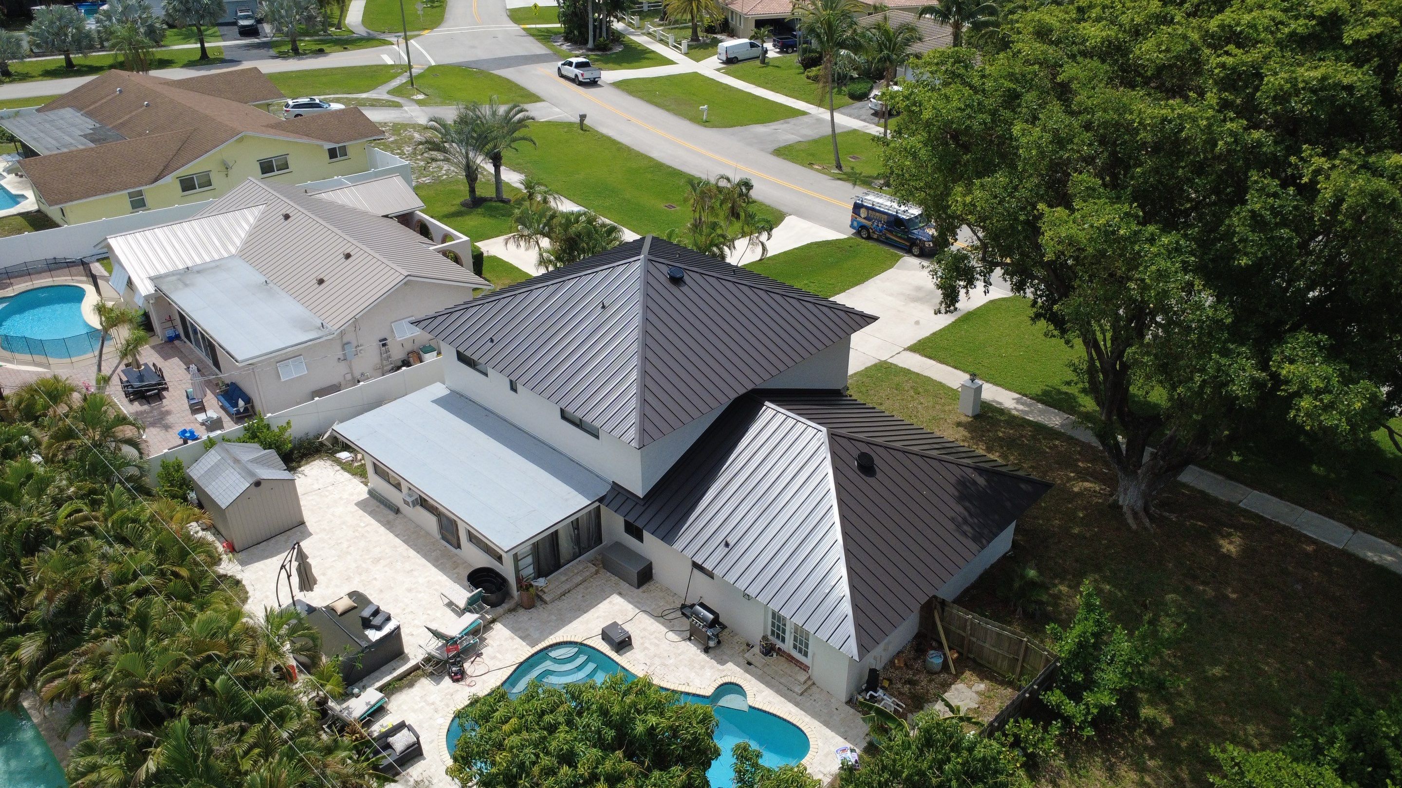 Residential Roofing Installation using 1.5'' Mechanical Seam by BLUES BROTHERS ROOFING