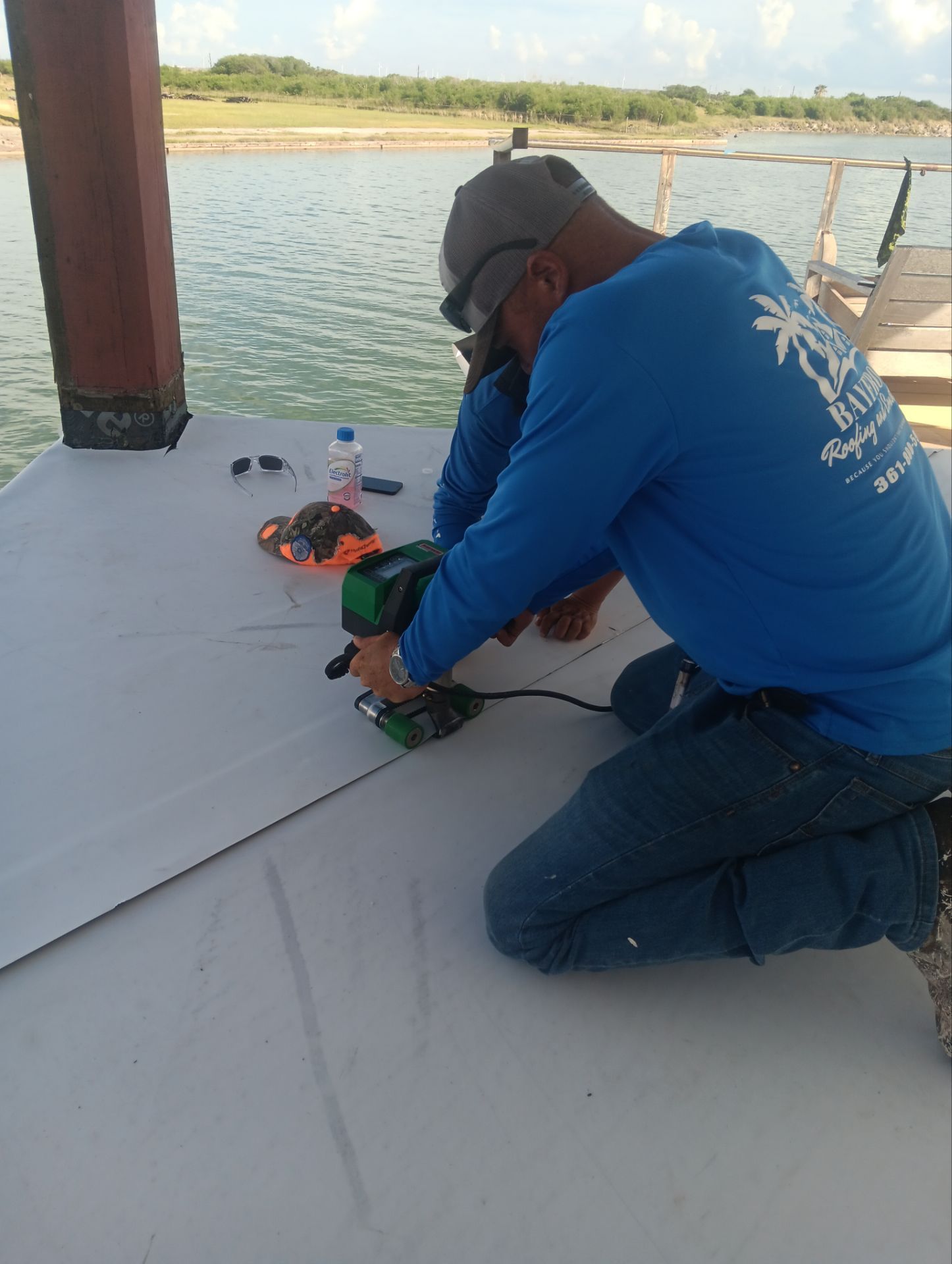 Walk Out Patio Cover by Bayfront Roofing and Construction