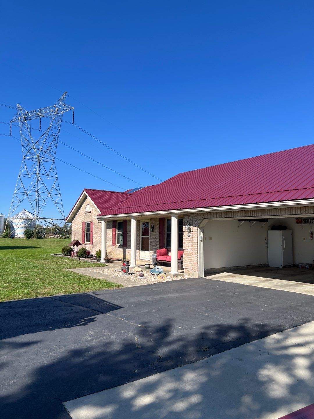 Residential Roofing Installation using Performance Panel Metal - Burgandy by RoofX 