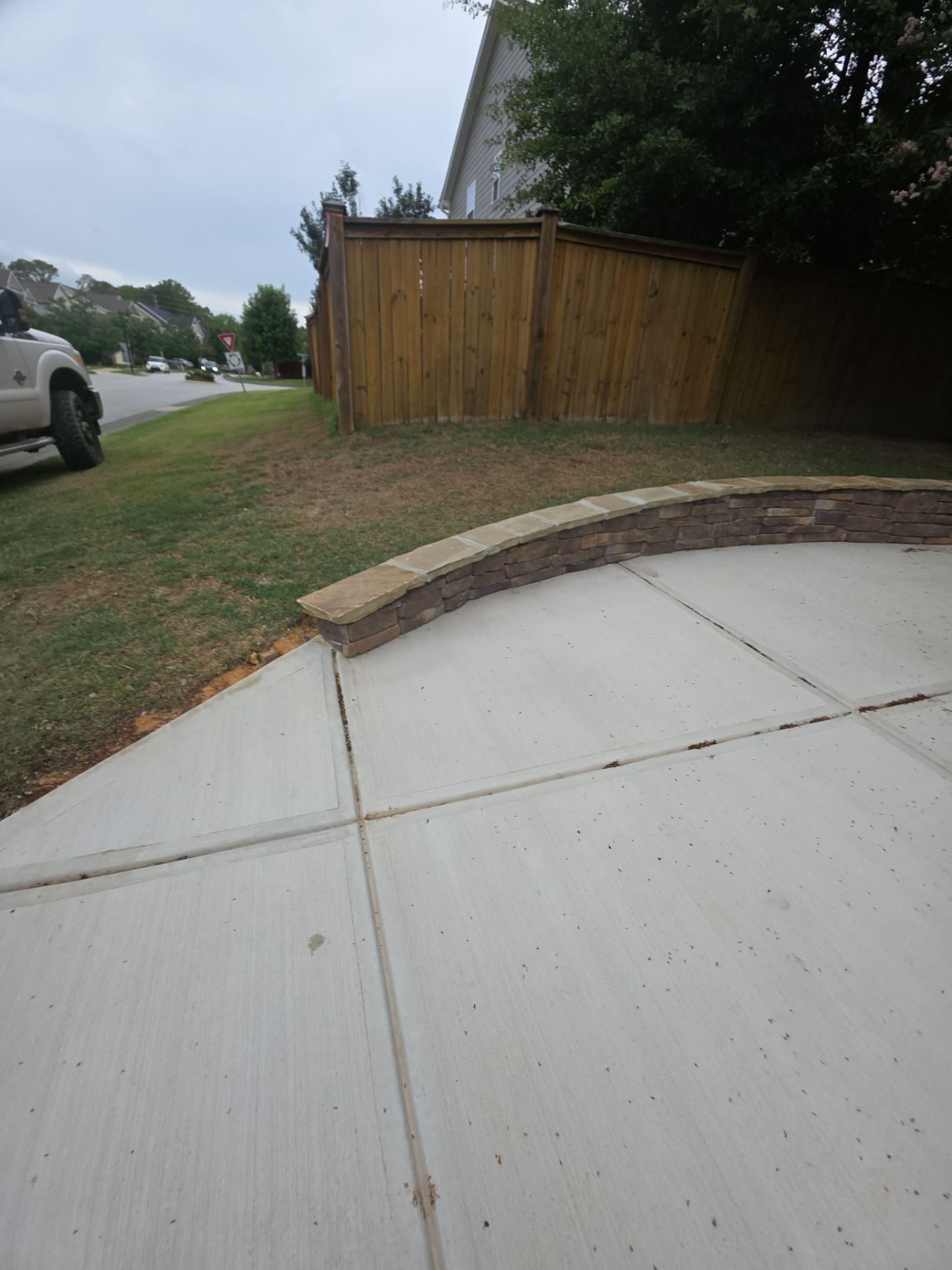 Concrete Driveway Expansion & Retaining Wall | Apex, NC by Elite Remodeling and Design LLC