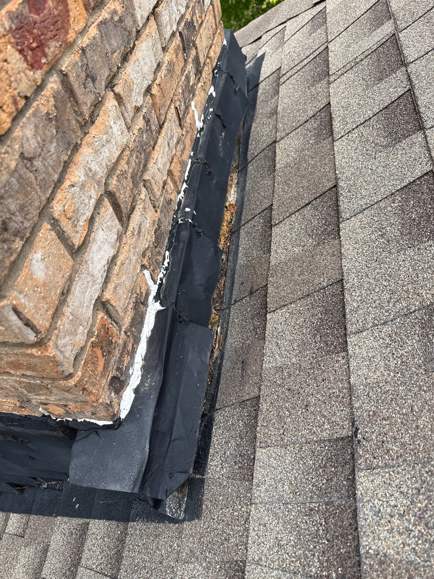 Cricket and Flashing Repair  by Rhino Roofing and General Contracting, LLC