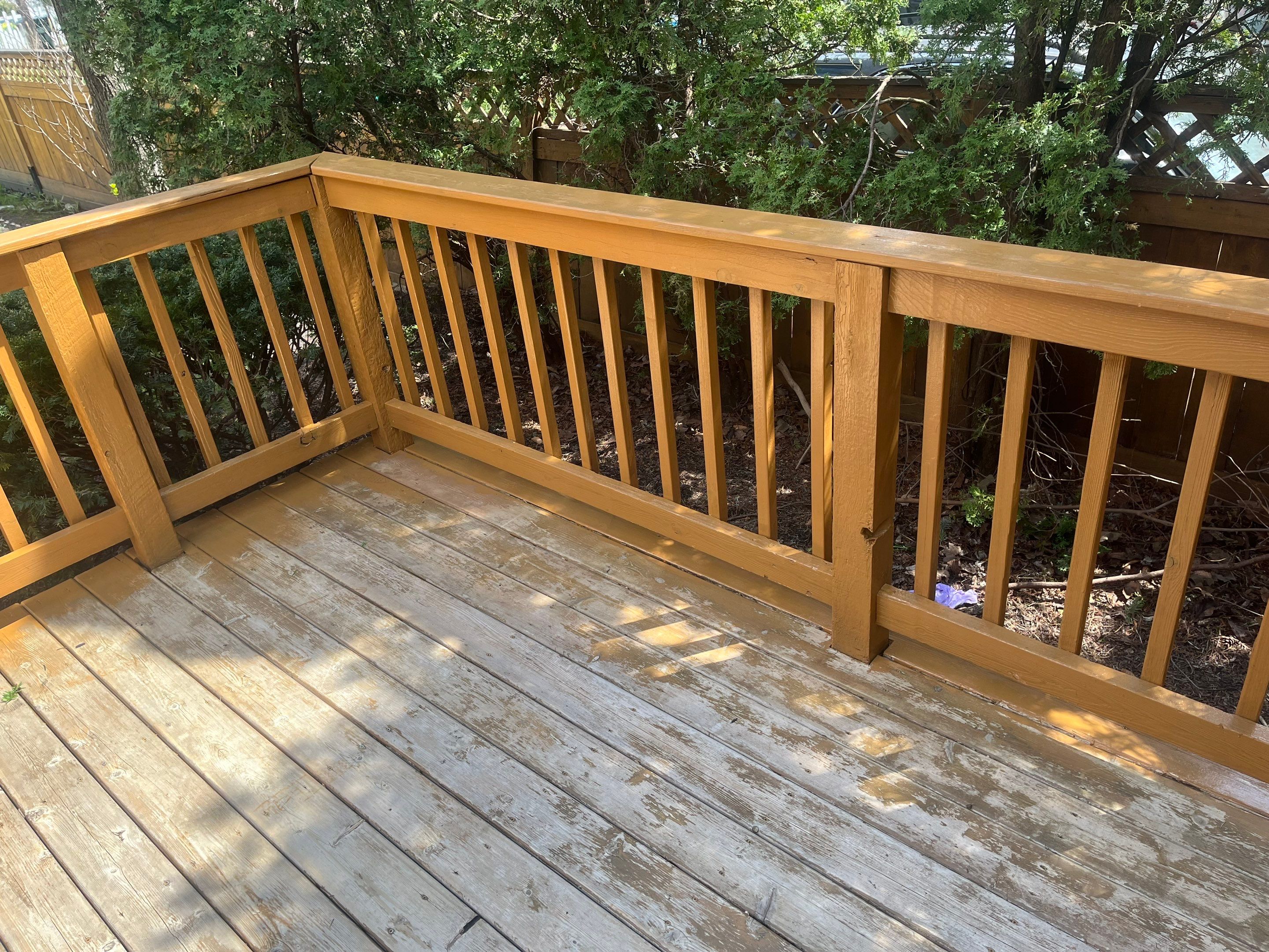 Wood cleaning and staining using Armstrong cloark oil stain by Northern Power Washing LLC.