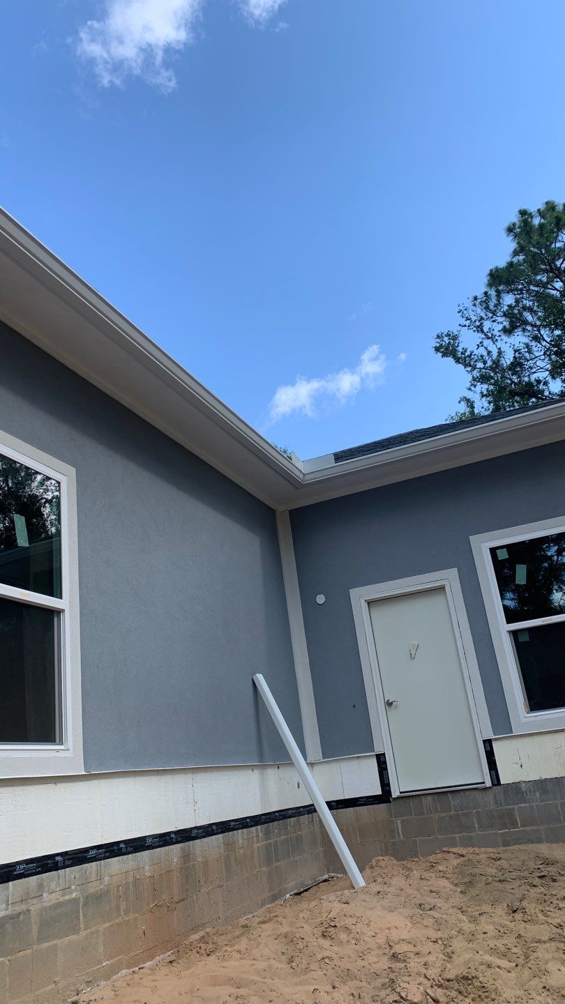 Seamless Aluminum Gutter Installation using 6 Inch Seamless Gutters in MIlton FL by Gutter Professors