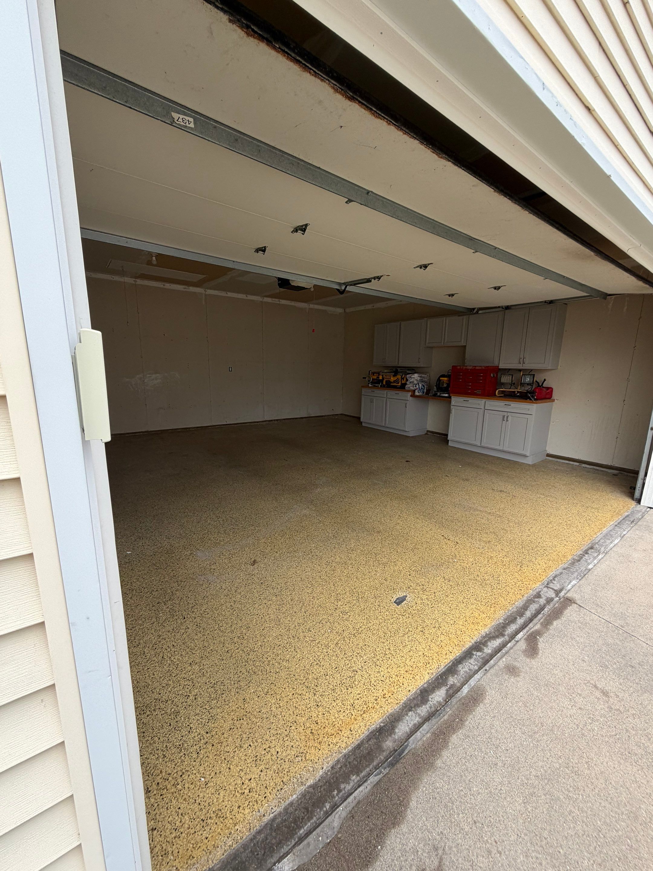 Ames Garage Floor Coating - Epoxy Replacement by Revival Concrete Coatings