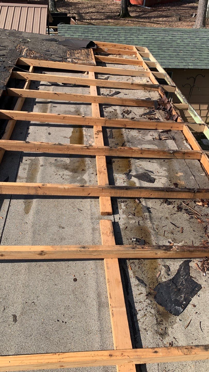 Residential Roofing Installation using 29 Gauge Colored Metal by Hostetler Roofing
