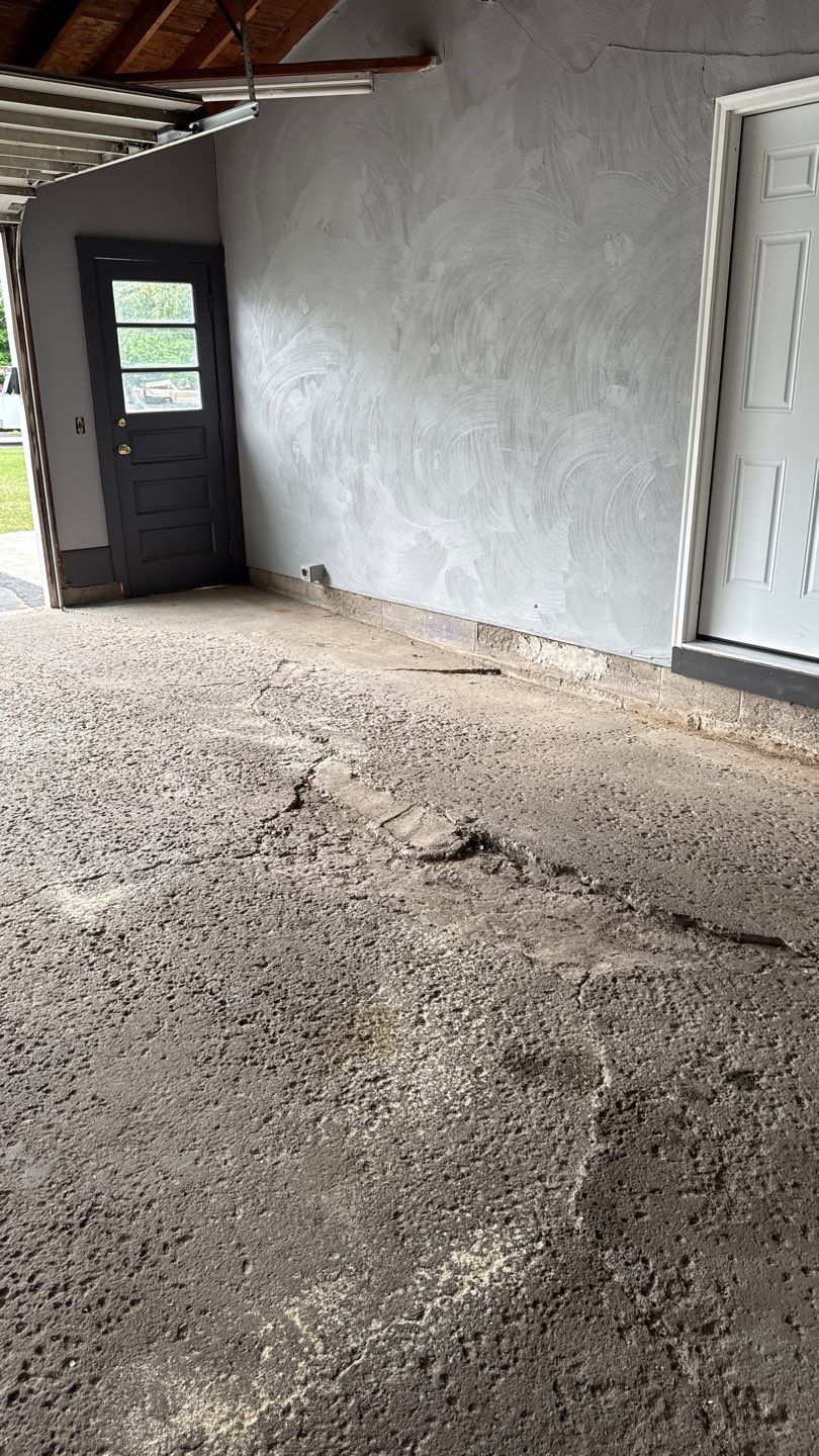 Concrete garage floor replacement and epoxy coating installed  by NG Masonry & Construction LLC