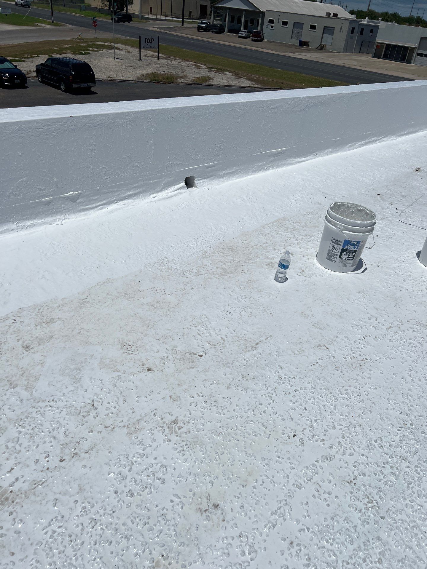 Dirty leaking Gravel Roof by Bayfront Roofing and Construction
