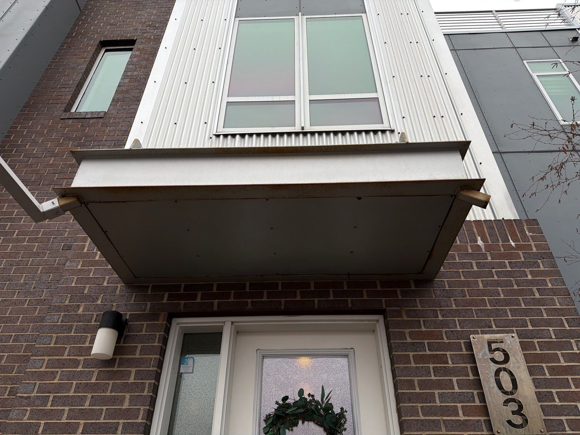 Modern Multi-Unit Exterior Painting and Siding Refresh in Sioux Falls by Select Painting, Coatings & Garage Cabinets