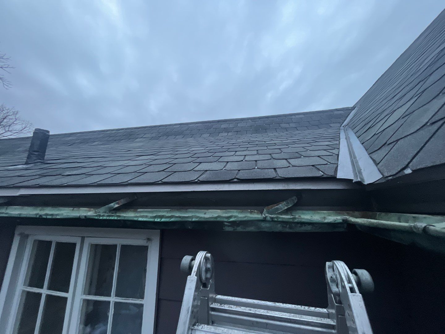 Slate Roof Removal using Atlas Storm Master Slate by Total Exteriors