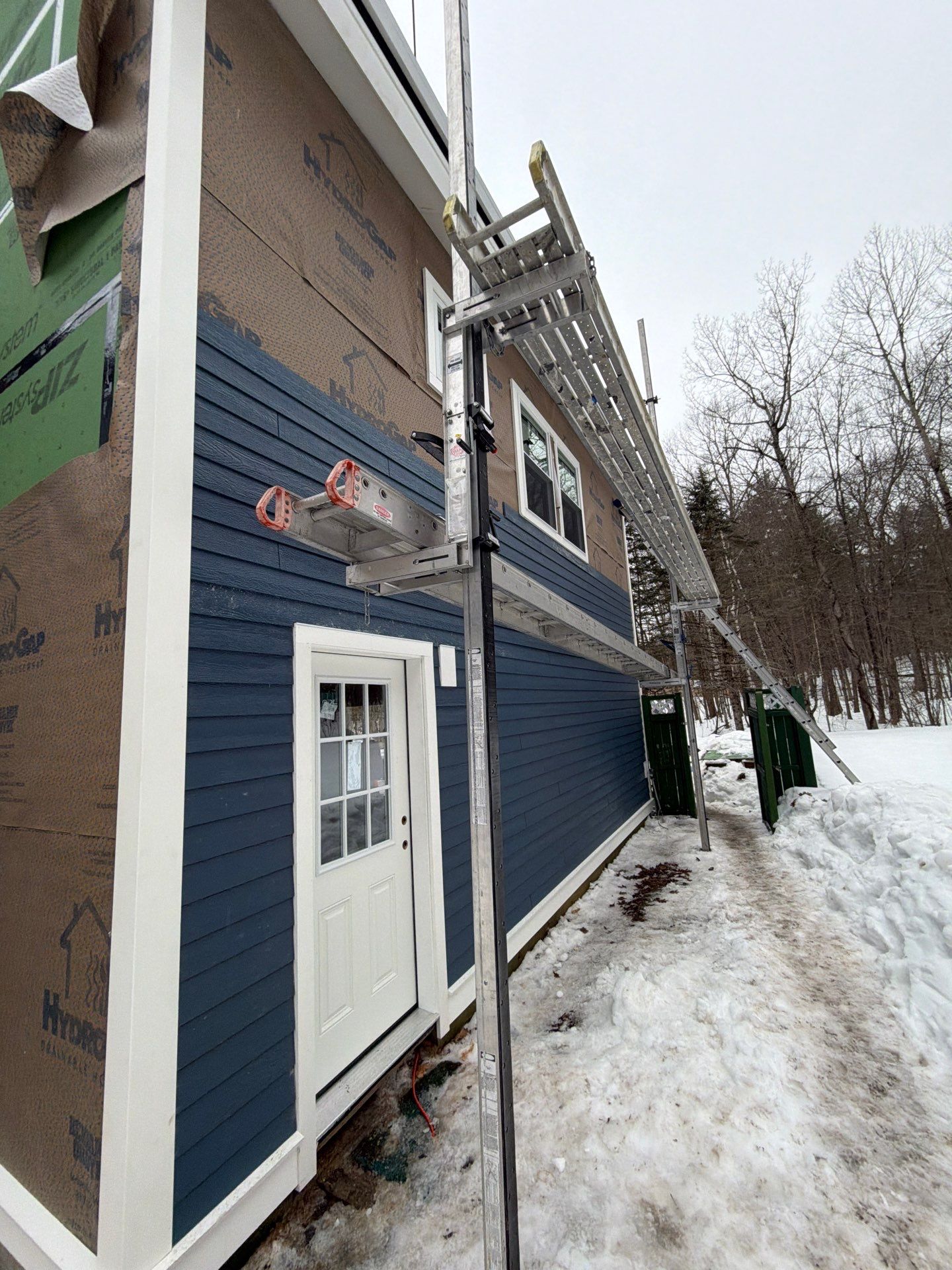 Custom ADU Construction with Vaulted In-Law Suite – LP SmartSide®, ZIP System® & Harvey® Windows by Sensible Home Solutions