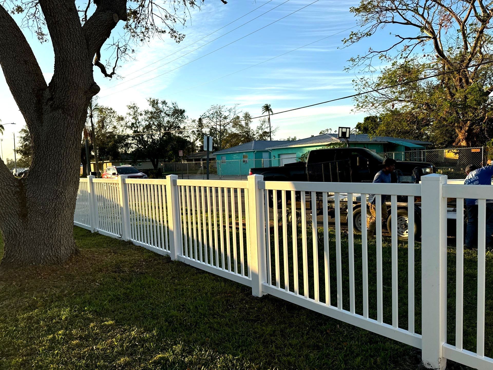 Vinyl Fence Installation using 6Ft White Vinyl Privacy Fence and a 4Ft White Vinyl Picket Fence by Asap fence and gates, LLC