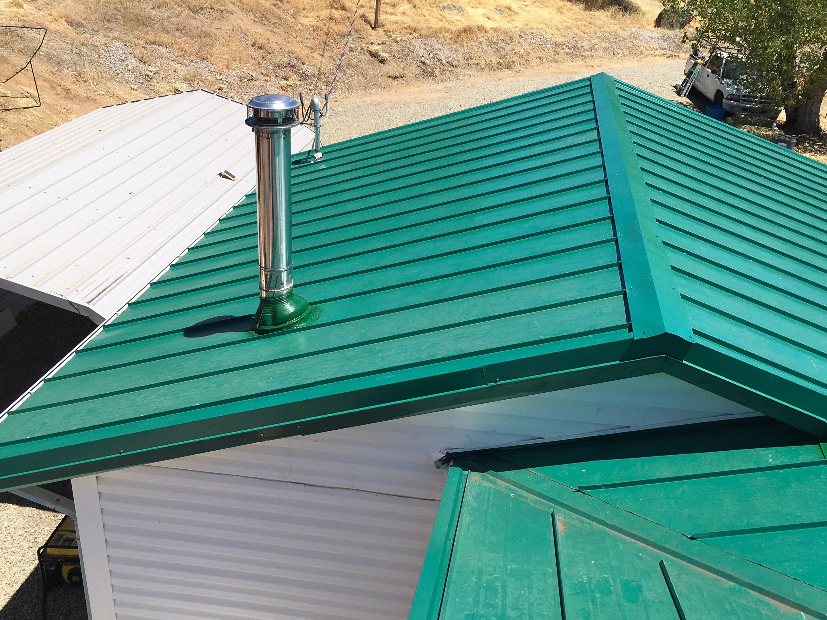 Metal roofing installation using Standing seam metal roofing system by Straight Edge Roofing Inc