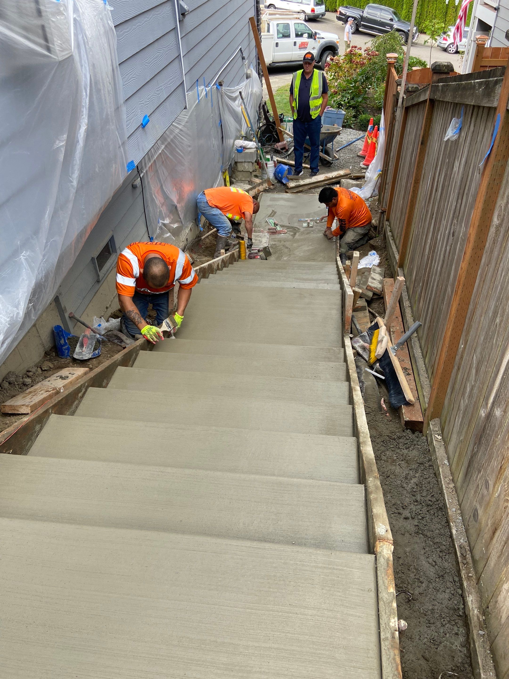 Jireh Outdoor Projects | Concrete Stair Repair and Retaining Wall by Jireh Asphalt & Concrete Inc 