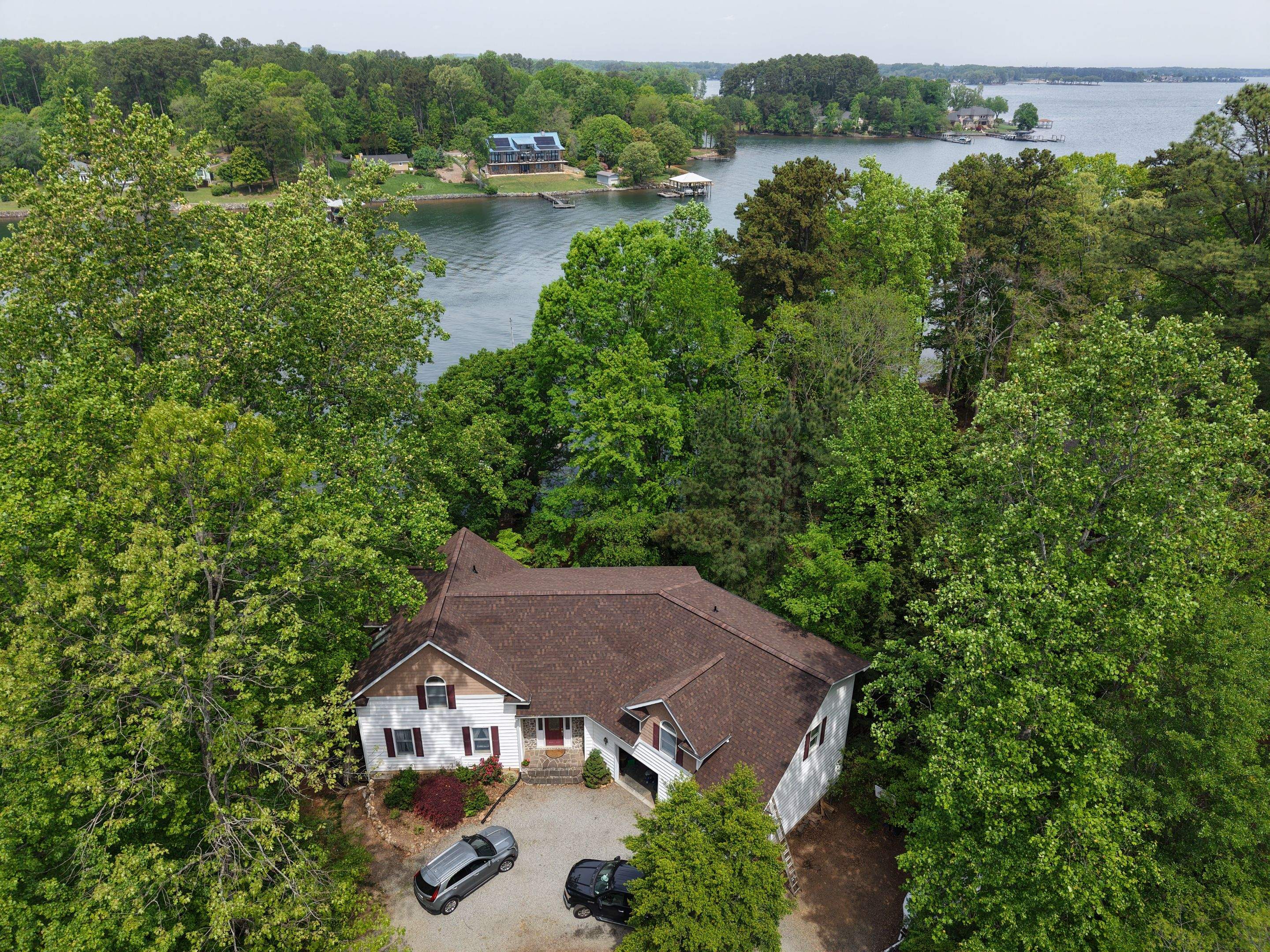Residential Roofing Installation using  TAMKO Titan XT Rustic Redwood by RISE Roofing & Restoration, LLC