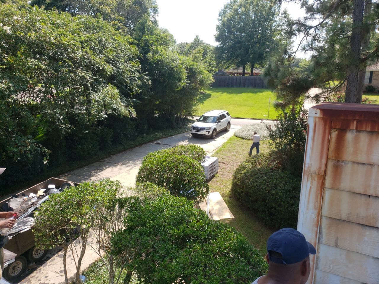 Residential Roofing Installation using Roof Replacement by American Roofing & Construction LLC