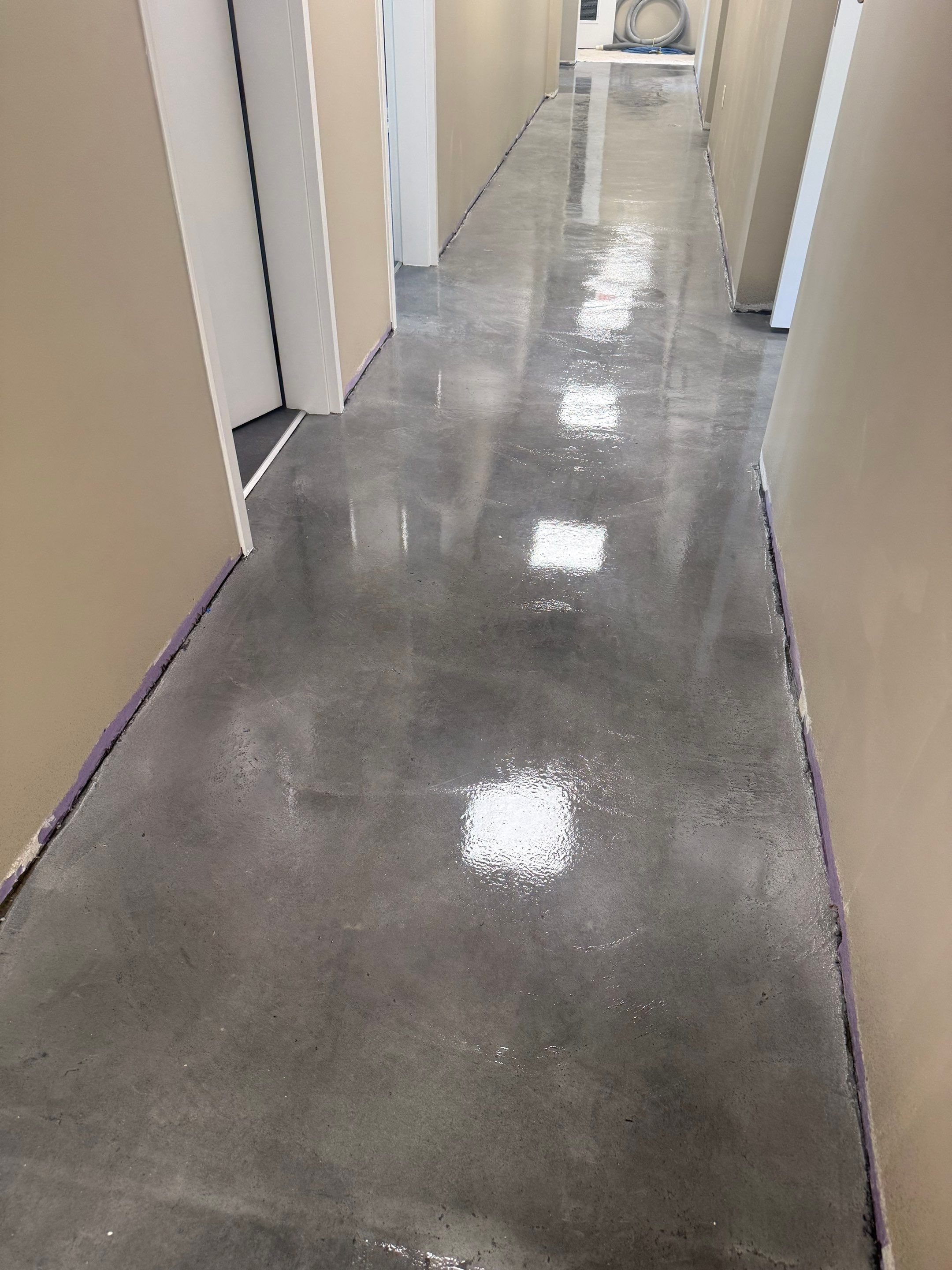 Industrial Epoxy Flake and Concrete Overlay Floor Installation in Pensacola by Cornerstone Hard Surface Restoration