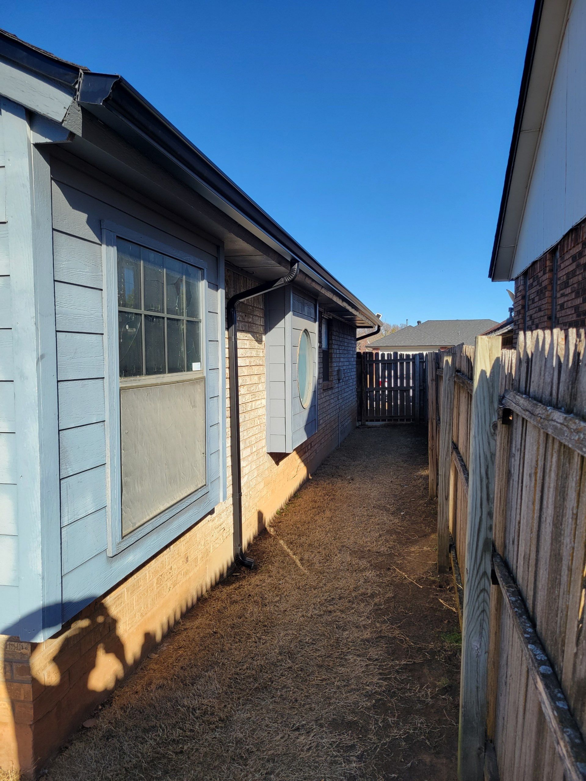 roof replacement & skylight installation & gutter installation in Oklahoma City by McCann's Roofing and Construction