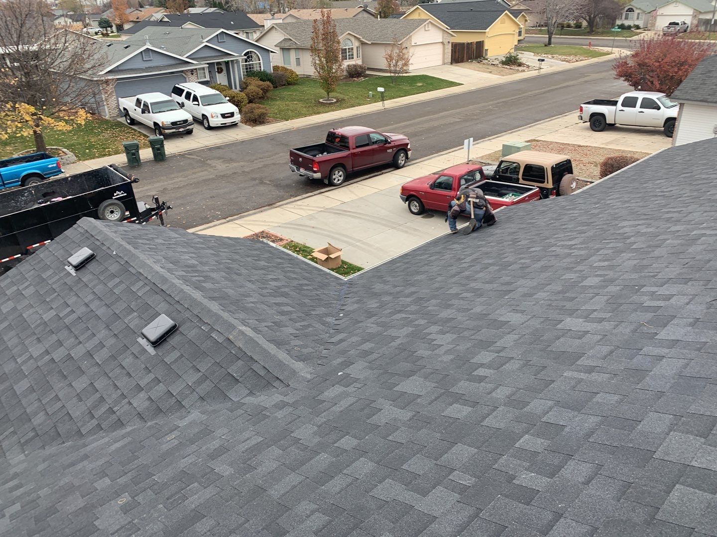 Meridian residential roofing installation using Duration shingles in Teak color. by ID Roofing LLC