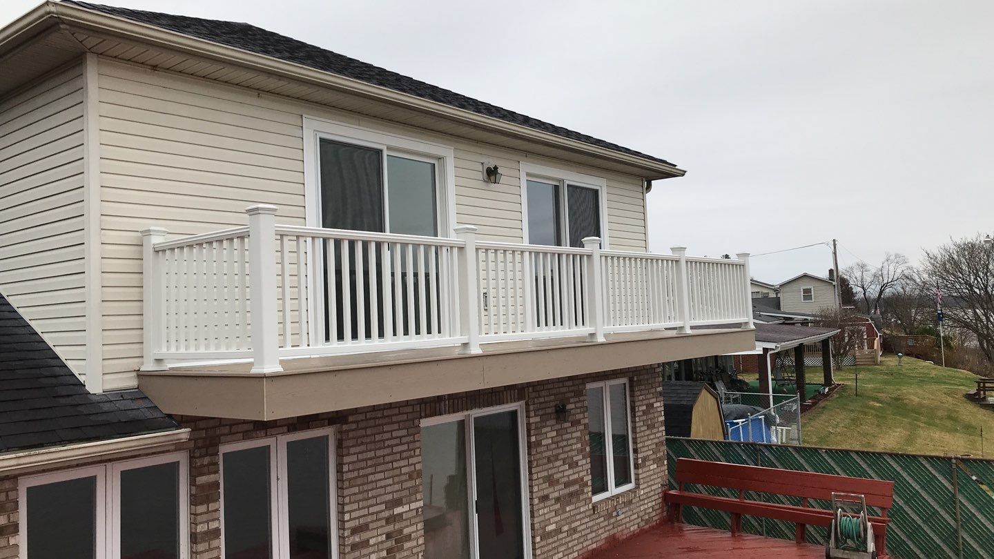 Deck Refurbush and Door Replacement using Trex Decking and Railing.  Polaris Patio Doors by Secure Construction Company Inc