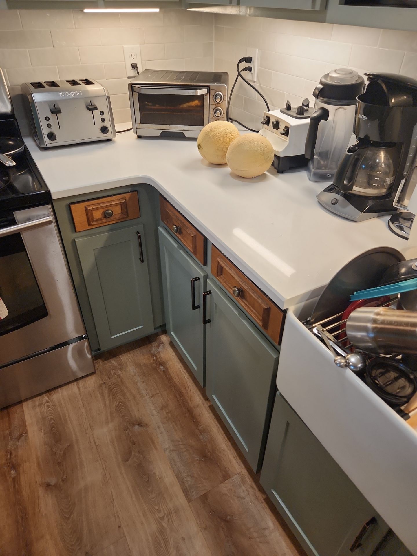 A Pathway to Personality – A Two-Tone Kitchen Transformation in Apex by Elite Remodeling and Design LLC