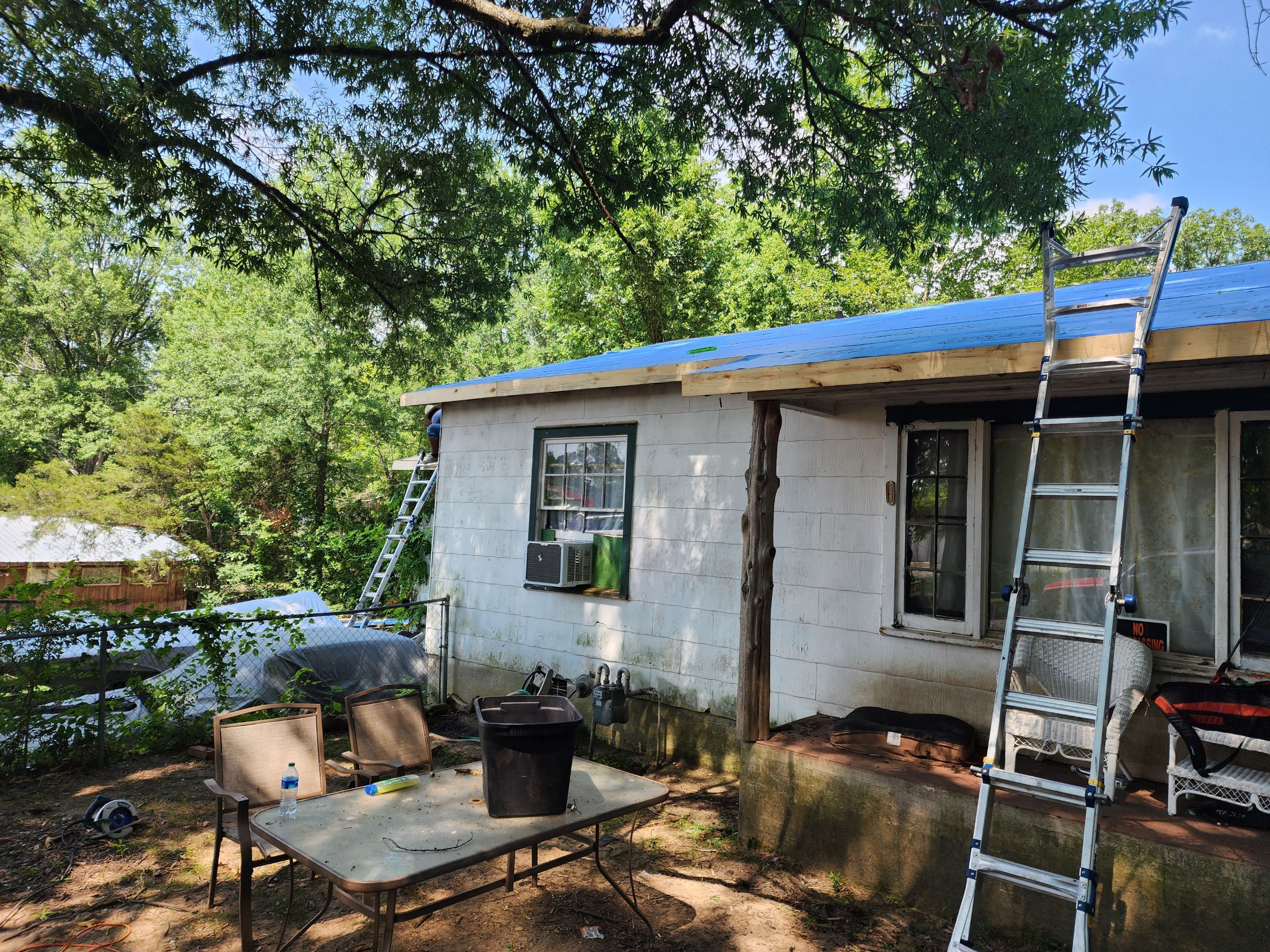 Residential Roofing Installation using 29 Gauge Galvalume Metal by Hostetler Roofing