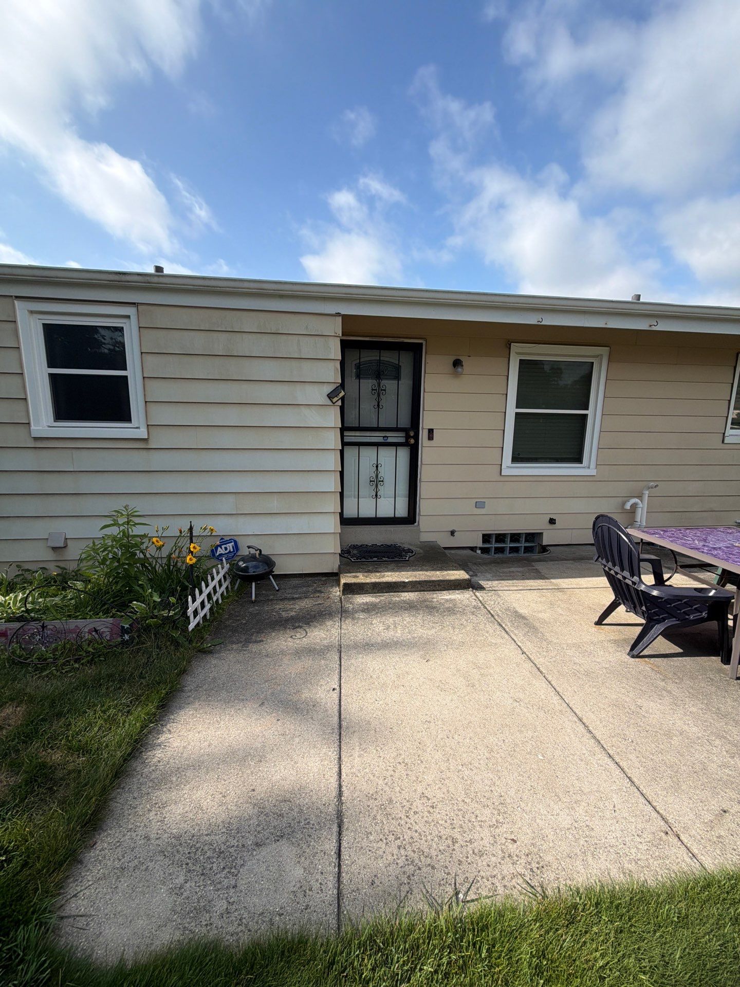 Milwaukee Residential Exterior Renovation with Siding and Concrete Upgrades by OCS Contracting Services