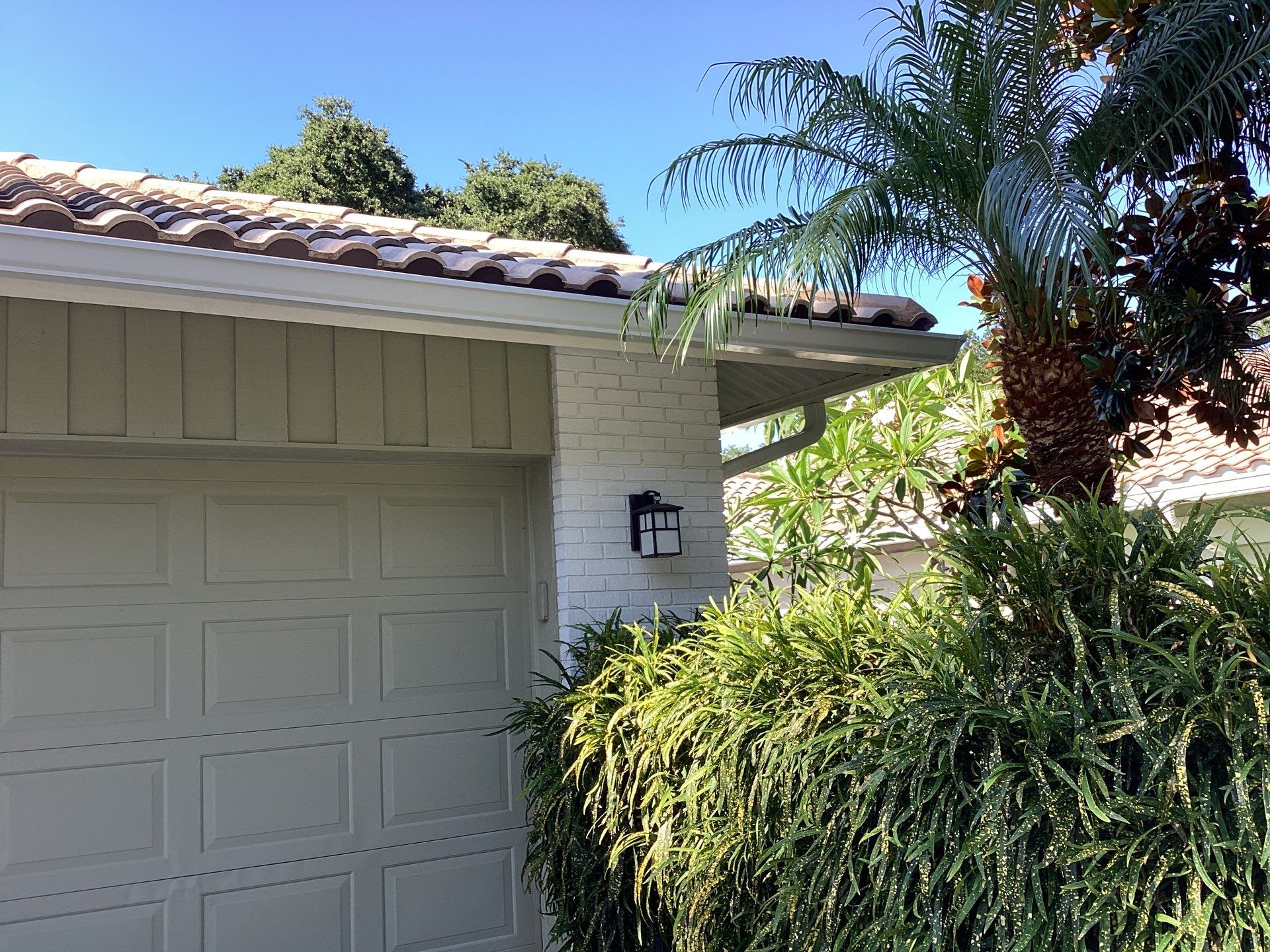 White Gutter Installation in Sarasota FL by Gutter Professors