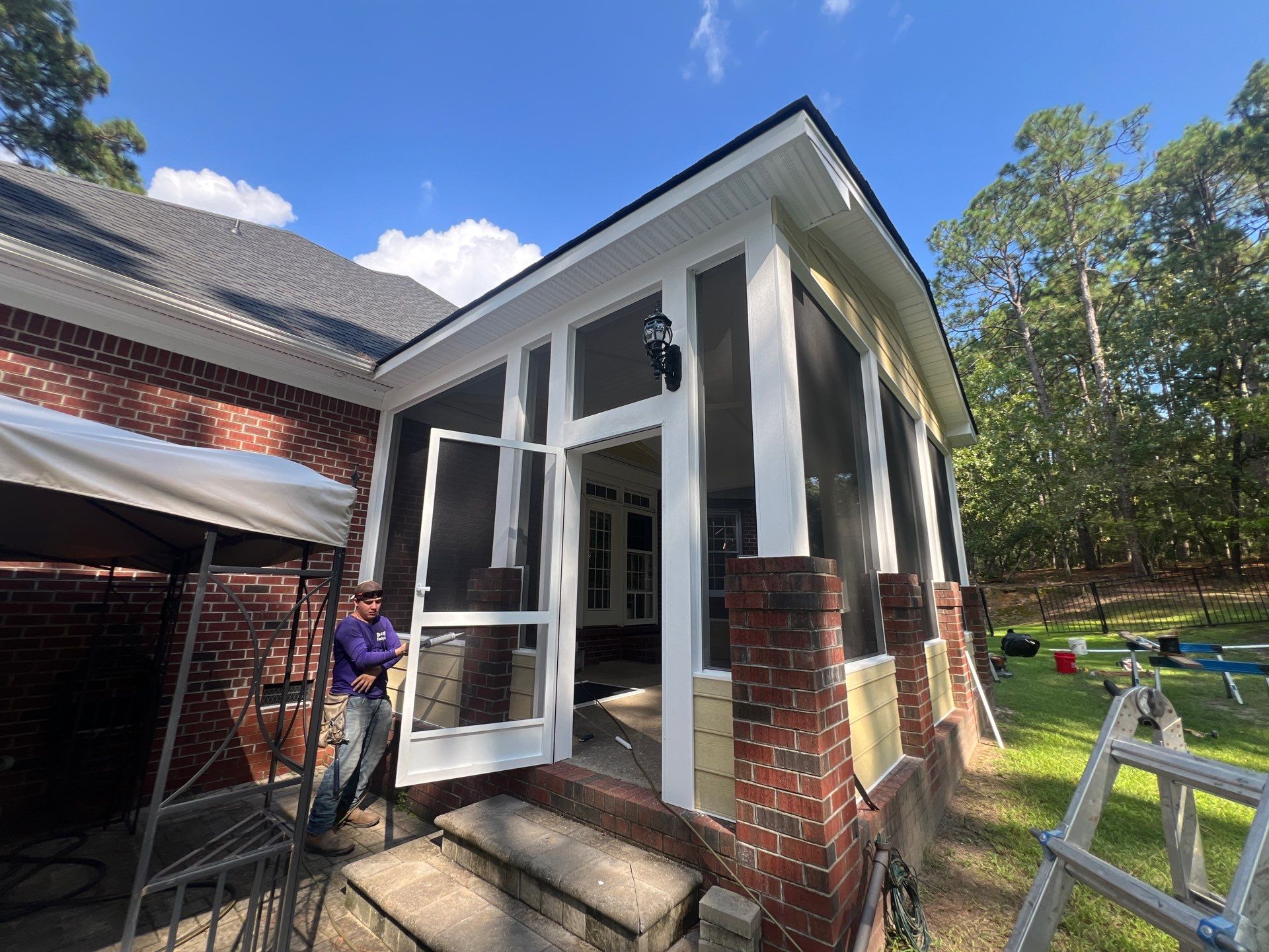 Custom Screened-In Porch Addition with Open Gable Roof in Fayetteville by The Remodeling Company