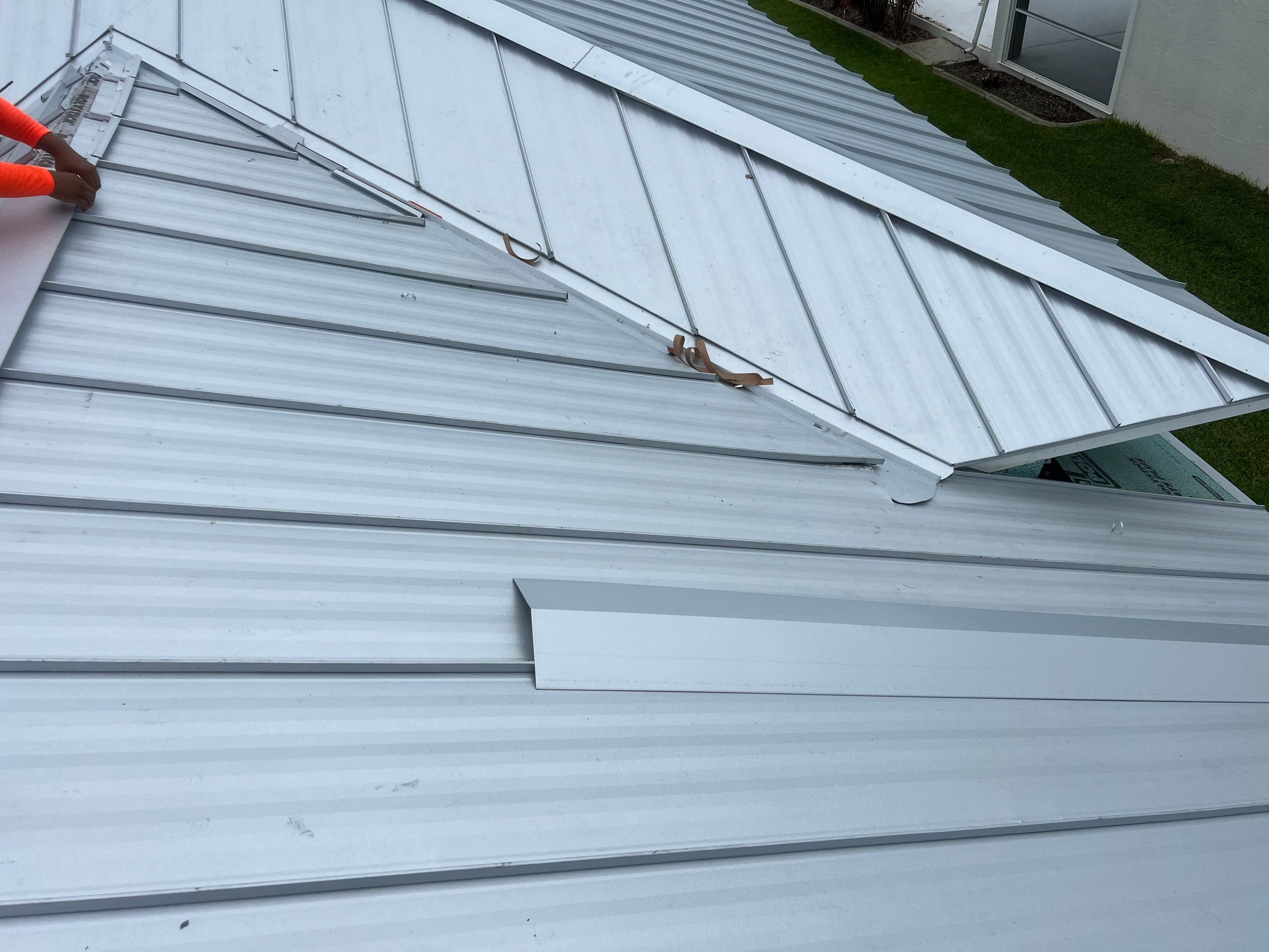 Residential Roofing Installation using Standing Seam Metal by Protek Roofing Heating Air & Solar