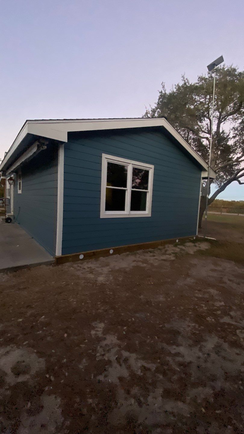 Customized Cabin by Bayfront Roofing and Construction