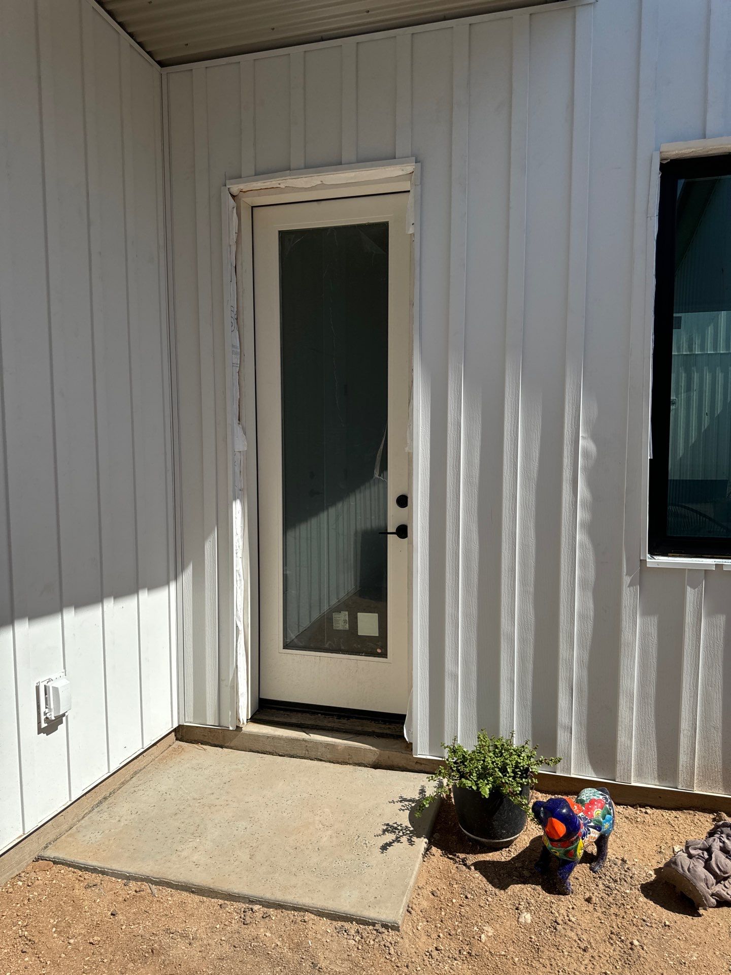 Polar White Metal Siding by Reimagine Roofing