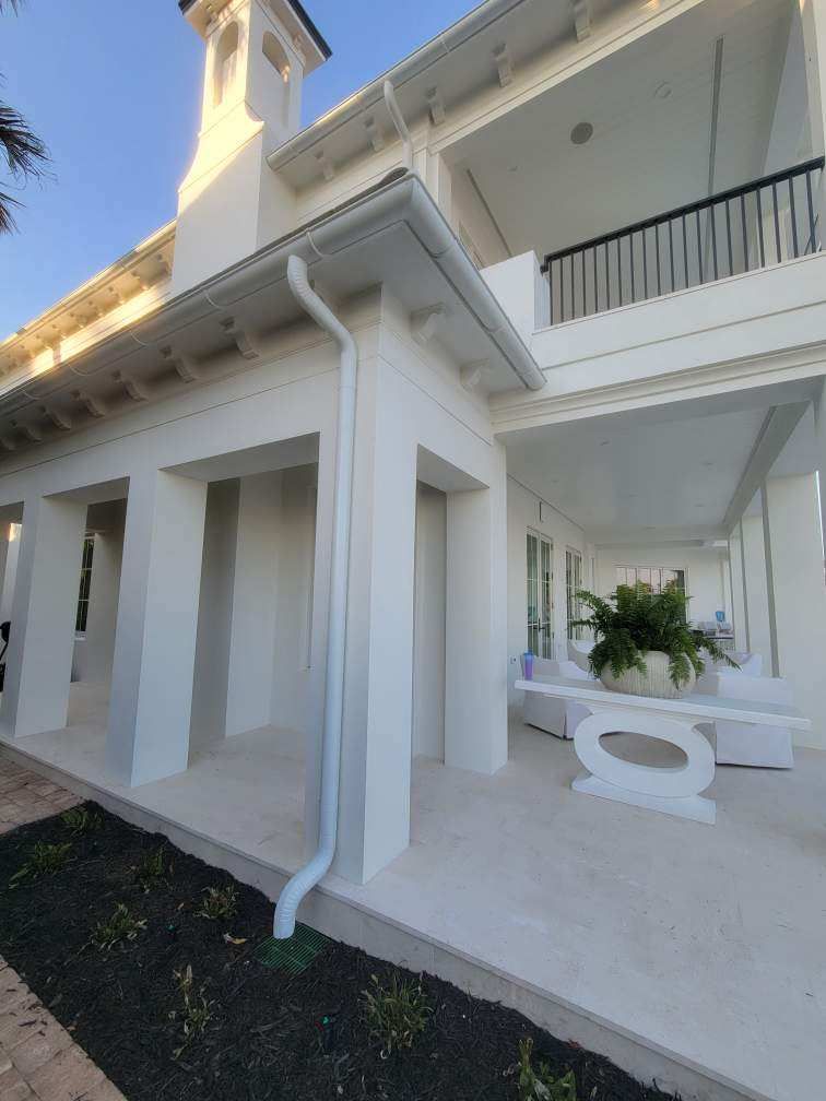 Residential Seamless Gutter Maintenance by Gutter Professors