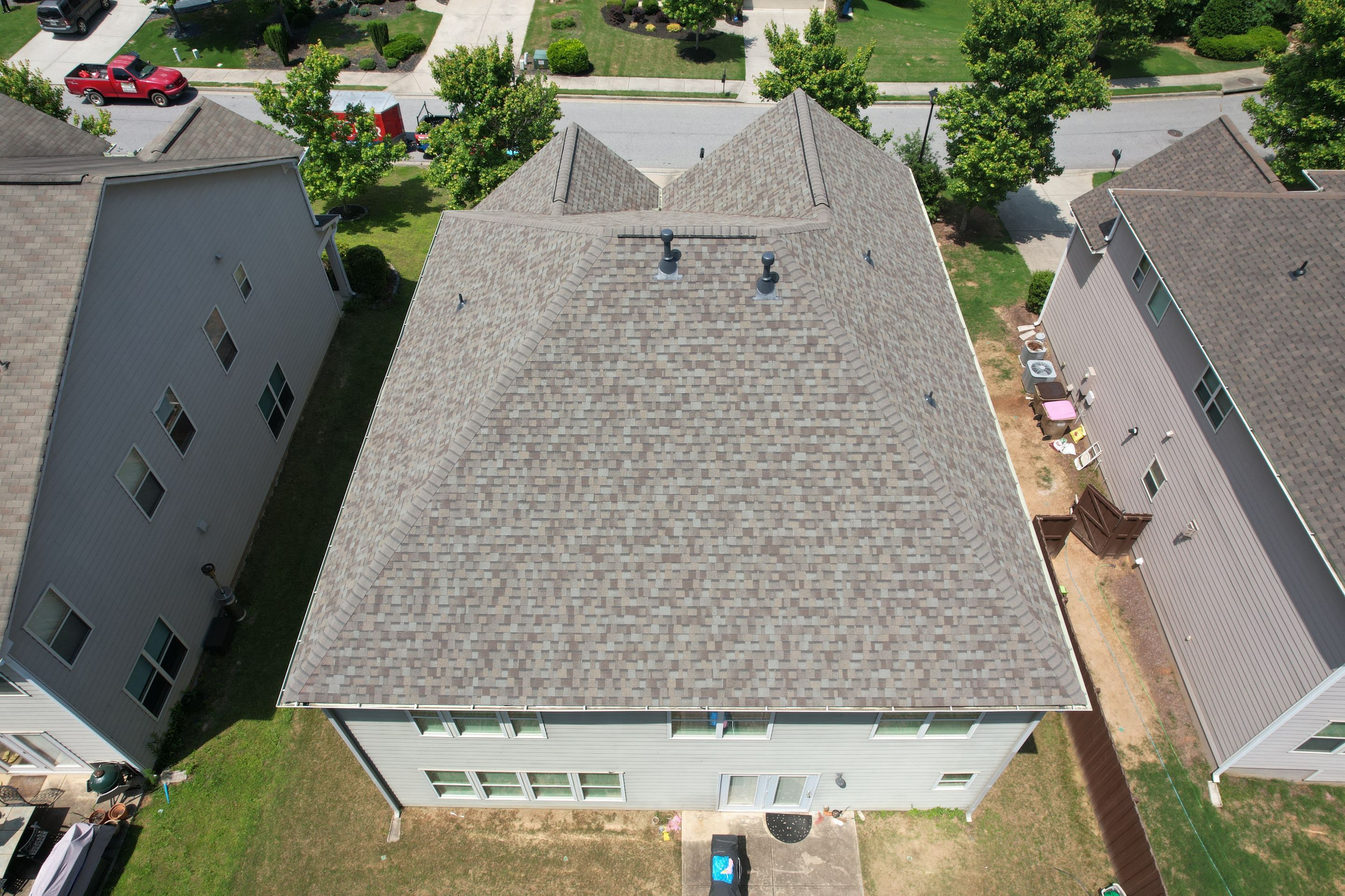 Residential Roof Replacement using Owens Corning TruDef Driftwood by Inspector Roofing and Restoration
