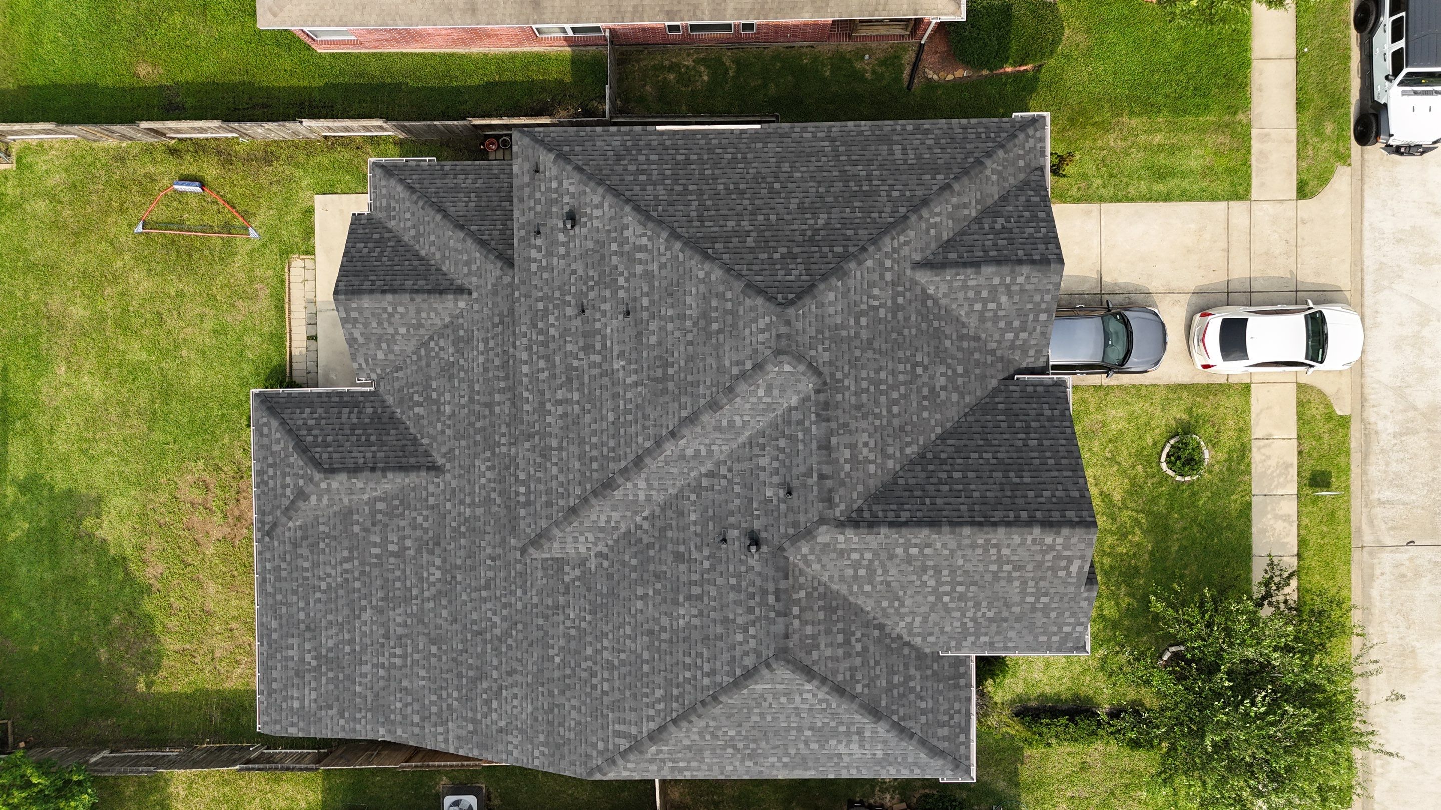 Residential Roofing Installation using IKO Dynasty by Core Four Roofing