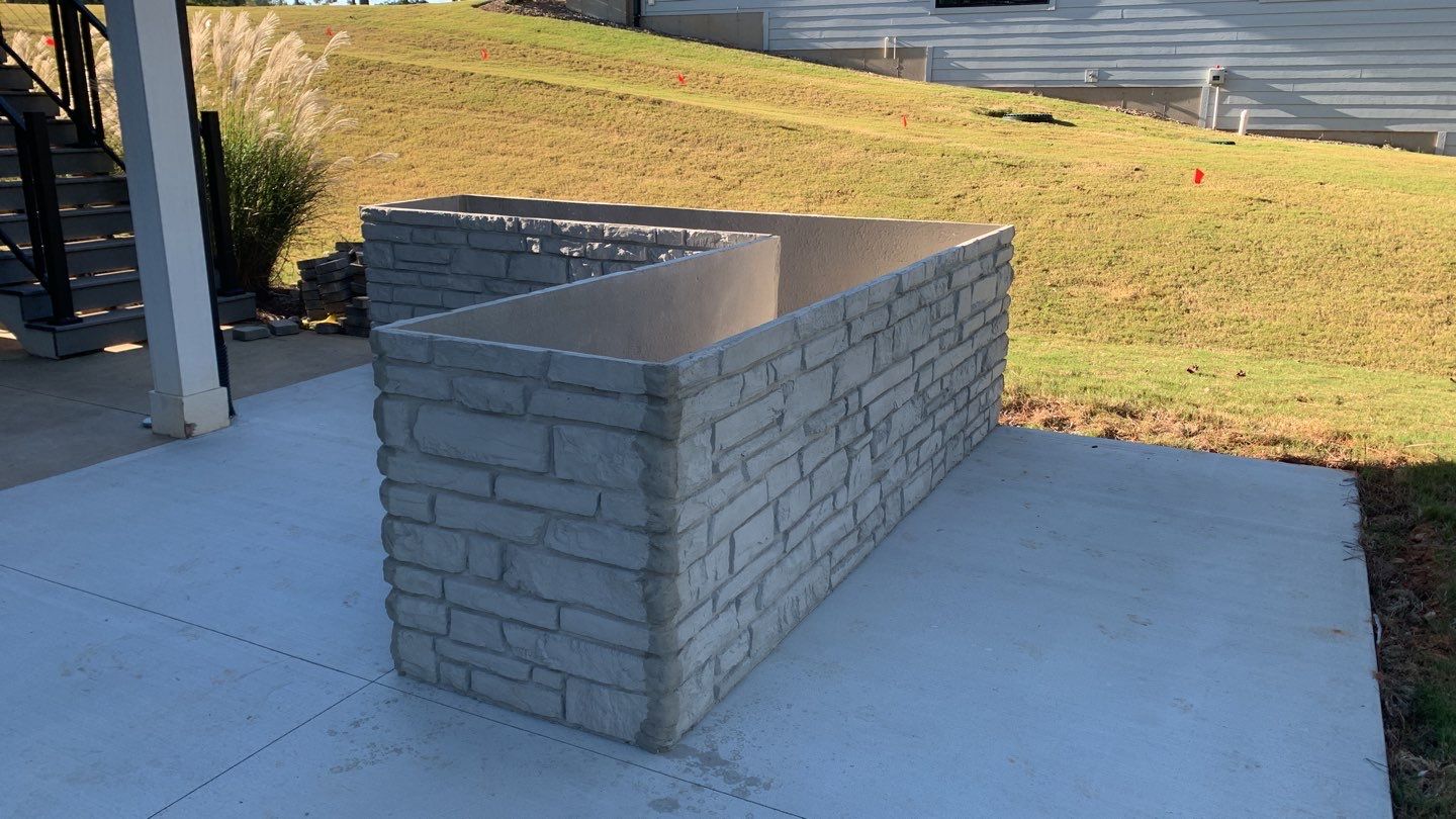 Outdoor Kitchen on Lake Keowee by Xtreme Concrete Services