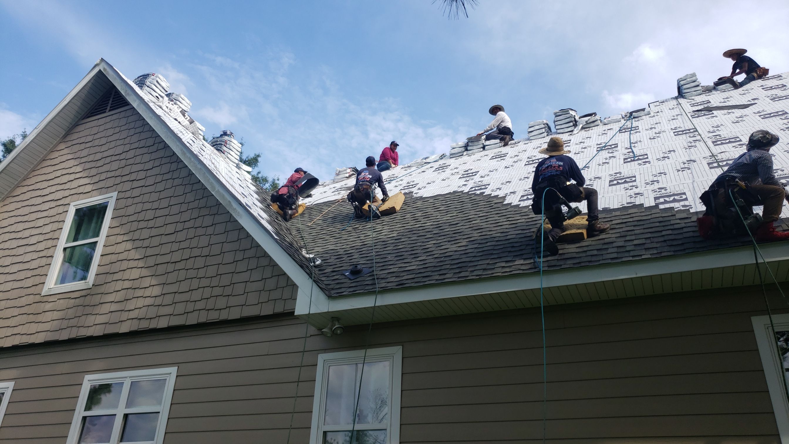 Residential Roofing Installation using Roof Replacement by American Roofing & Construction LLC
