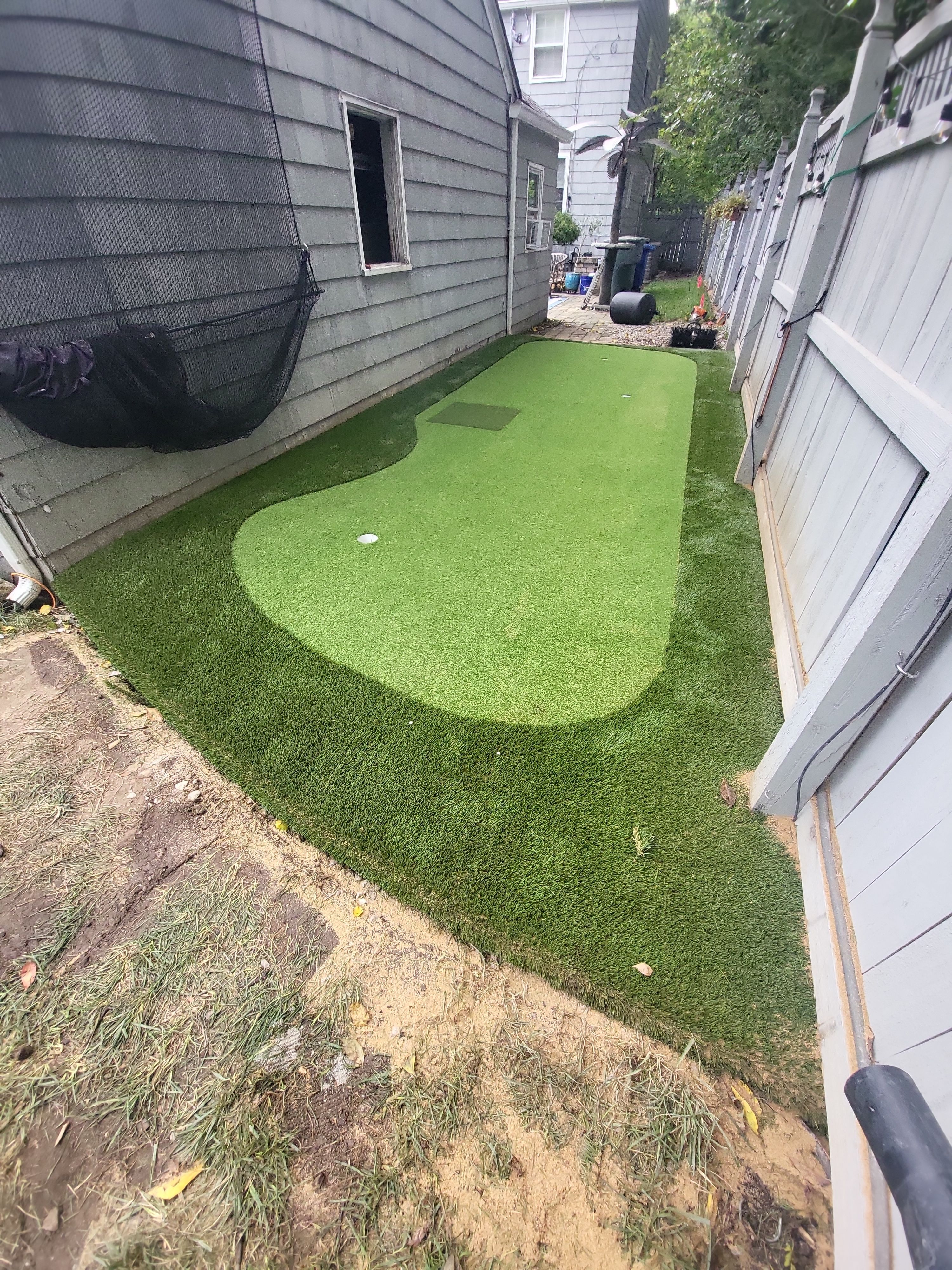 Custom Side Yard Artificial Turf Putting Green Installation in Columbus by Southwest Greens Midwest