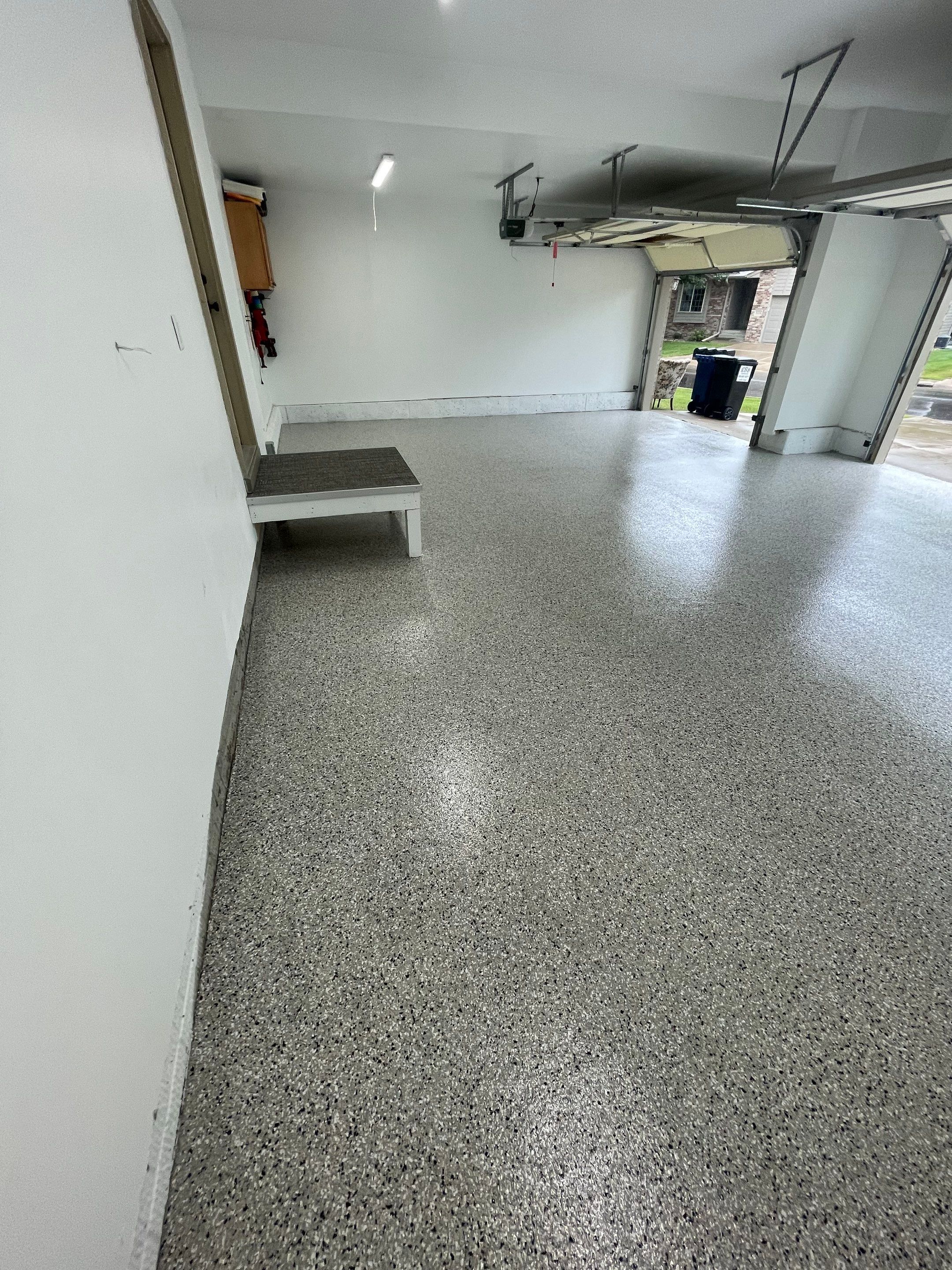 Cabin Fever Garage Floor System in Sioux Falls by Select Painting, Coatings & Garage Cabinets